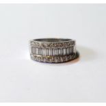 Diamond half eternity ring with baguettes and brilliants, in 18ct white gold, 2006, size O½.