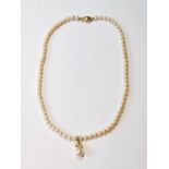 Cultured pearl necklet with diamond-set drop, 18ct gold.