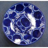 Large blue and white charger decorated with simplistic blossom and fretwork, 47cm diameter.