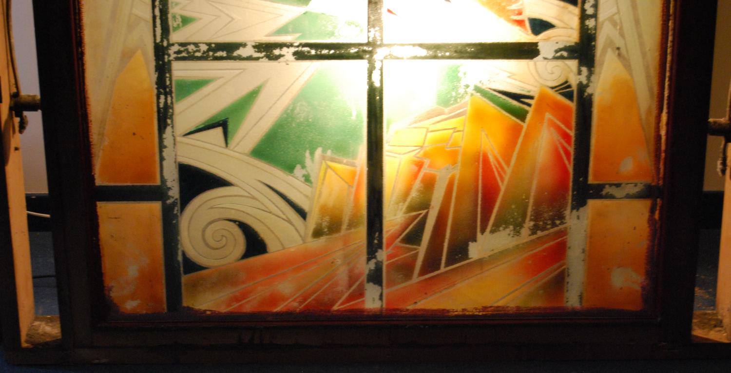 Large Art Deco painted glass cinema panel depicting a sailing ship, decorated in greens and oranges, - Image 9 of 10
