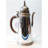 Silver large coffee pot of plain tapering shape with domed cap, side handle and lidded spout, by