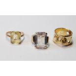 Gold pierced band ring with citrine and another two, all 9ct.