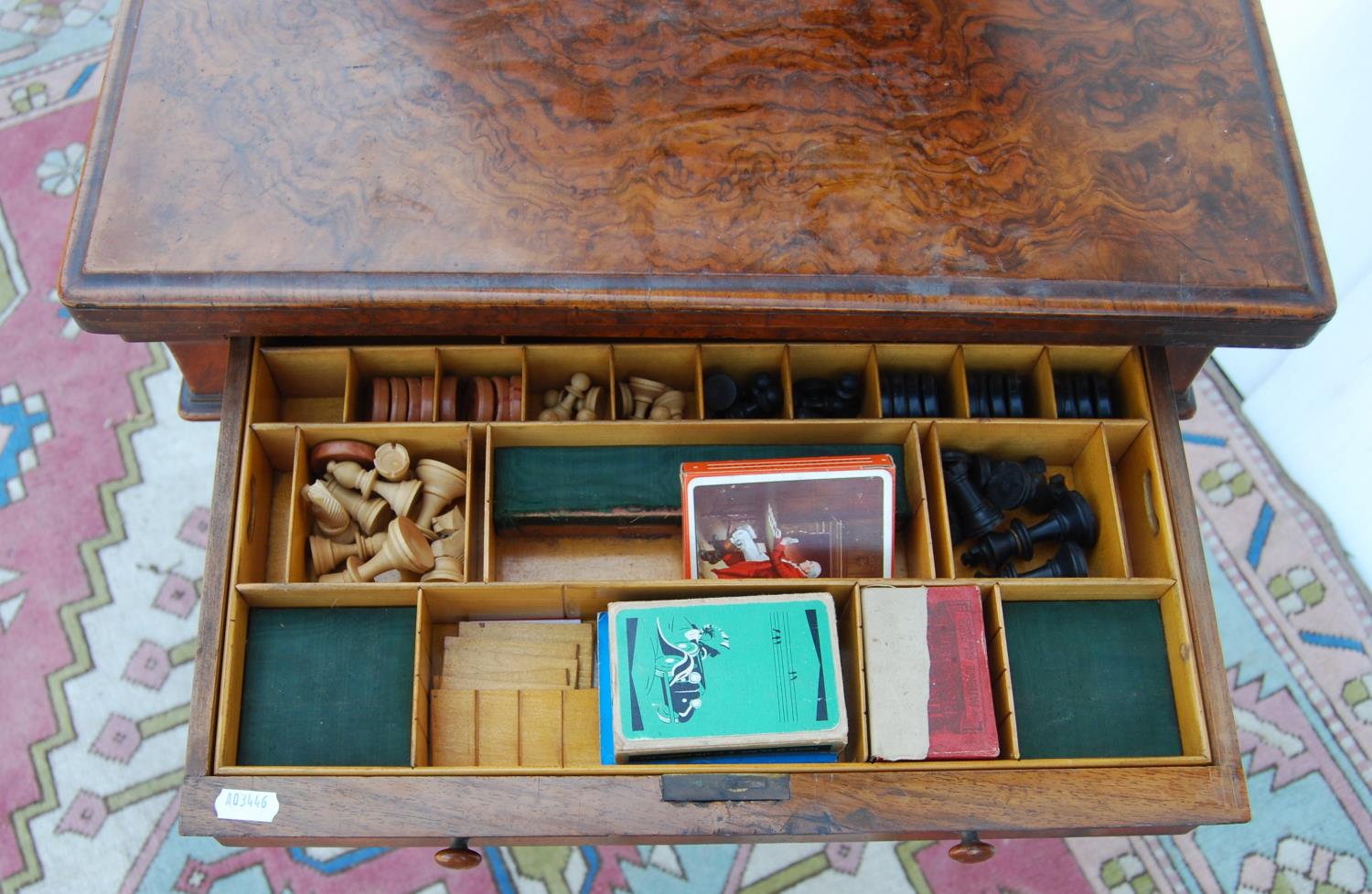 Late Victorian walnut games table, the hinged moulded rectangular top enclosing chequer board over - Image 5 of 5