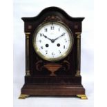 Mahogany and inlaid mantel clock by J Bryson, Edinburgh, the arched pediment over circular white