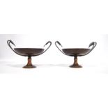 Pair of bronzed tazza in the classical manner, each with vine leaf handles over a circular dish with