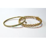 Indian gold bangle with pearls and another with diamonds and emeralds, gross 20g.  (2)