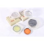 Three Leica Ernst Leitz Wetzlar lens filters including two Uva in HOOIV boxes and one "1", also