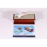 Danbury Mint "Concorde - Queen of the Skies" medal, stamp and sculpture set comprising Maiden Flight