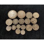 Collection of world silver coins of various grades to include an .800 grade 1964 Canada dollar and