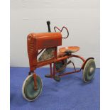 Vintage Triang Major tractor peddle car in red oxide paint with applied engine decals to the side.