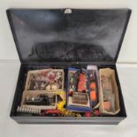 Collection of vintage toys in japanned metal box to include small model trains and a collection of