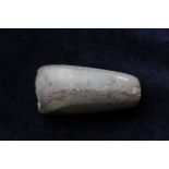 Neolithic- German polished stone axe head with chipped edge. The axe head originates from central