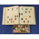 Collection of world postage stamps to include a Strand stamp album folder and a box containing