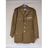 British Army uniform, an olive green jacket having Gaunt of London Royal Corps of Signals