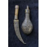 Lot comprising of a Victorian bronze powder horn with embossed floral decoration and a middle