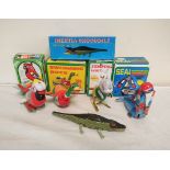Collection of vintage Chinese mechanical clockwork tinplate animals all boxed. To include a
