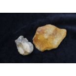 Neolithic- Two stone age flint cores a byproduct of tool manufacturing one of amber coloured flint