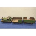 Wooden model train with two carriages. Painted green and marked LNER. (3)