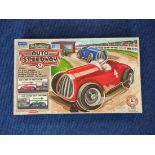 2007 reissue clockwork Schylling Auto Speedway complete with three tinplate cars and box.