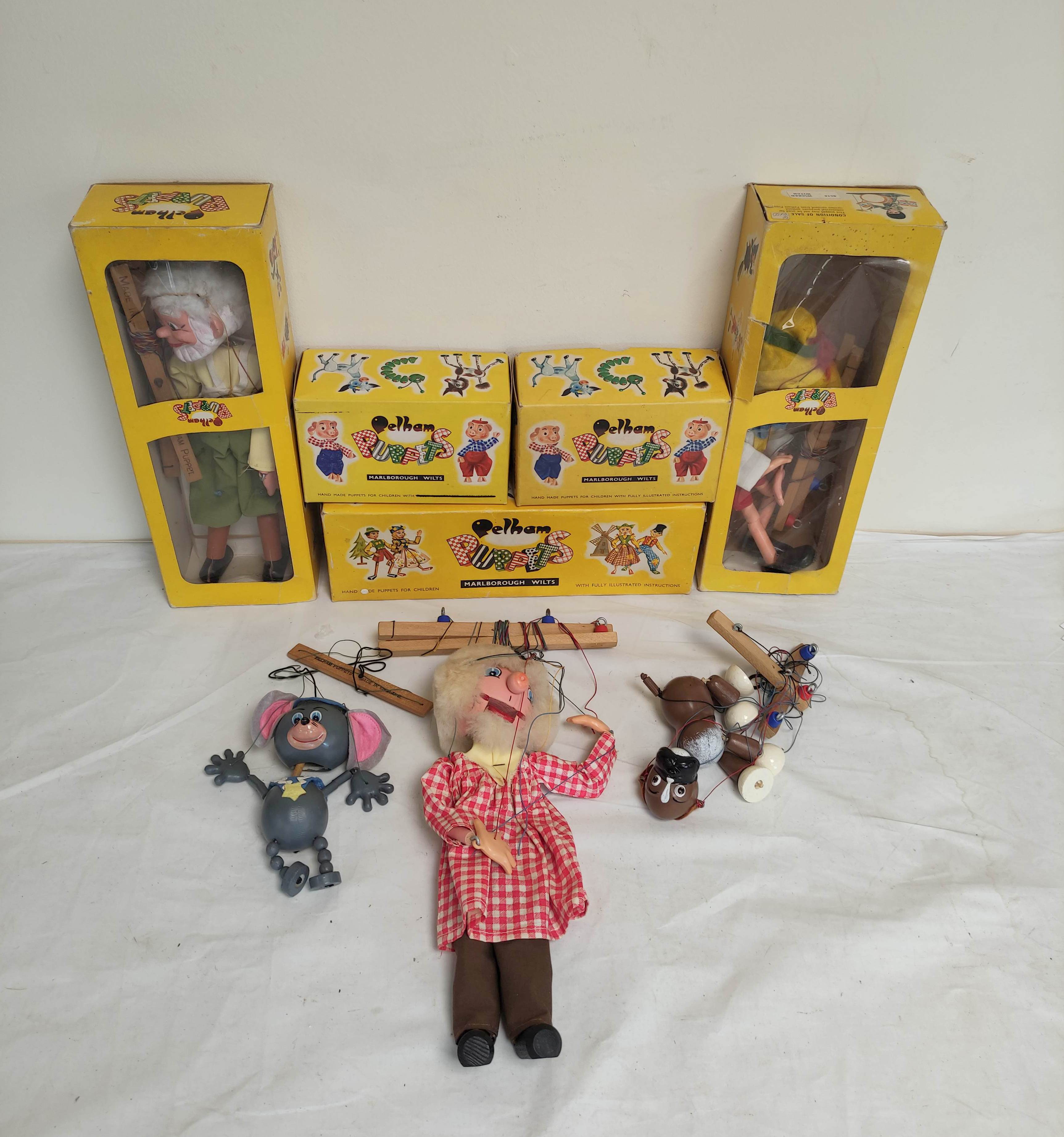 Collection of vintage boxed Pelham puppets including A9 Mouse, SM Farmer, SL3 Fairy, SL10 Wicked