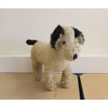 Vintage 1940s Merrythought Hygenic Toys England mohair dog with amber glass eyes.
