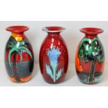 Three Anita Harris Studio Pottery vases of ovoid form with flared rim decorated with thistles,