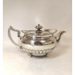 Silver tea pot of compressed spherical shape engraved and semi-gadrooned, by Robertson & Walton,