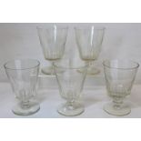 Set of five large clear glass rummers, the half faceted bucket bowls on short knopped stem and