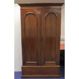 19th century mahogany gun cabinet enclosed by pair of panel doors. baize lined interior with gun