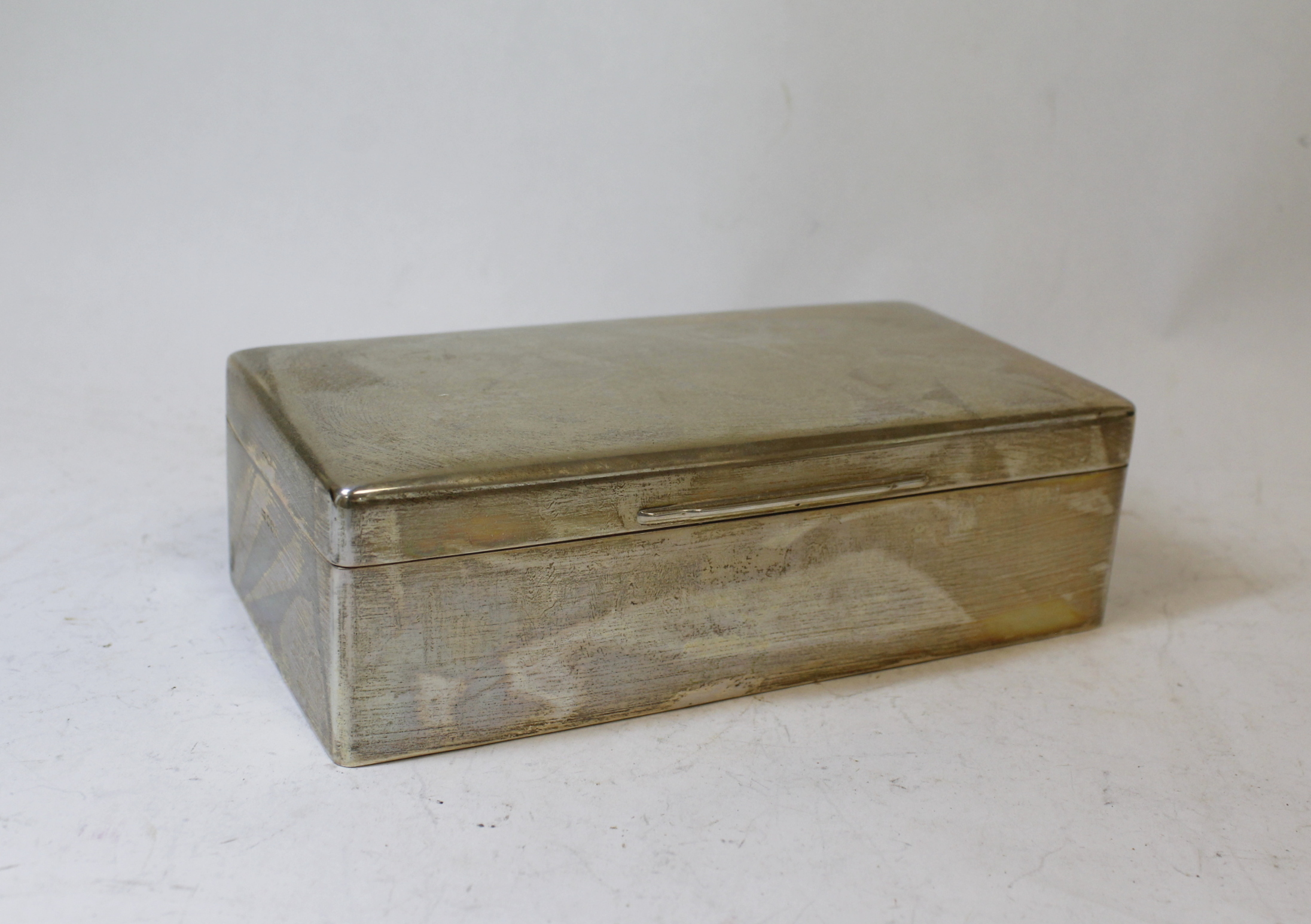 Silver cigarette box with cushion cover, plain, Birmingham 1940.