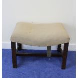 Georgian mahogany stool, the rectangular saddle seat raised on square chamfered supports with