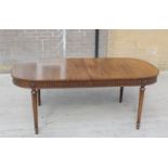 19th century D end dining table with carved frieze on turned fluted supports  198cm long, 77cm high,