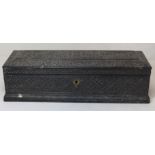 19th or early 20th century Eastern carved ebony box of rectangular form with floral and foliate