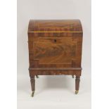 George III inlaid mahogany cellarette the domed top revealing fitted interior with brass lion mask