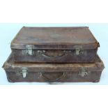 Two antique leather suitcases, one with engraved brass plaque inscribed "Lady Carlisle", 57cm wide