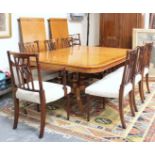 Good quality reproduction burr wood extending pedestal dining table and eight dining chairs.