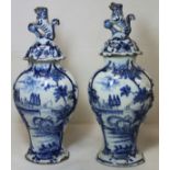 Pair of late 18th/early 19th century Dutch Delft blue and white vases of flattened baluster form