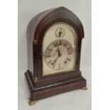 Edwardian period mantel clock by Winterhalder & Hofmeier with silvered dial, in strung mahogany