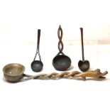 Antique treen ladle or spoon, the oval bowl with double twist stem and stylised dragon head