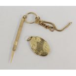 9ct gold tooth pick with chain and a 9ct gold locket, 16g.