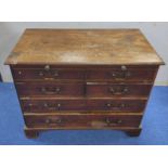 George III mahogany chest of drawers, moulded edge top above brushing or writing slide and two false