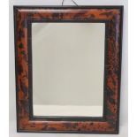 Small rectangular wall mirror with simulated tortoiseshell and ebonised frame, with label for the