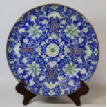 19th century Chinese porcelain plate the blue ground decorated with lotus flowers, lucky bats and