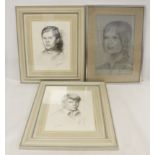 JOHN EDWARDS (b.1940) Two portraits of children. Black crayon. Each 38.5cm x 28.5cm.  Both signed.