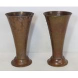 Pair of Keswick School of Industrial Arts beaten copper vases of flared footed form, impressed