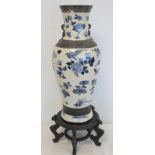 Large Chinese blue and white crackle glazed vase of baluster form decorated with birds and insects