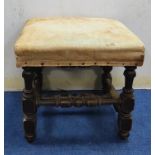 19th century square stool, the upholstered top on turned and squared supports with understretchers.