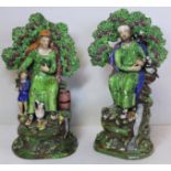 Early 19th century Staffordshire pearlware figures of "Elijah", the other depicting "The Widow",