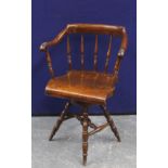 Victorian mahogany swivel office chair raised on bobbin supports