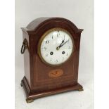 French early 20th century mantel clock in inlaid mahogany case with break arch, 24.5cm.
